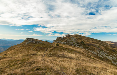 North European dramatic highland mountains scenery landscape background view in autumn season cloudy windy weather time 