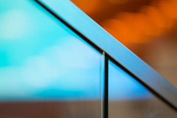 detail of stairway glass wall with railing