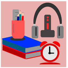 Book and pencil ruler headphone and alarm clock 