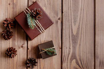 Vintage gift box with bow on wooden background
