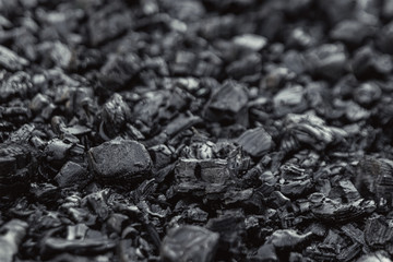 Dark coal texture, coal mining, fossil fuels, environmental pollution.