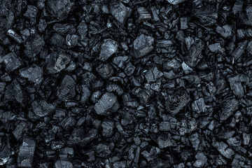 Dark coal texture, coal mining, fossil fuels, environmental pollution. - obrazy, fototapety, plakaty