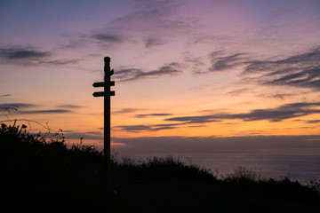 Beautiful view at dusk after sunset of a colorful pink purple sky on a hill, North of Spain