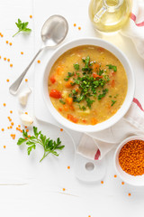 Vegetarian vegetable lentil soup with fresh parsley, healthy eating, top view