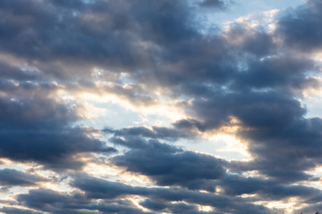 Dramatic sunset disappears behind a clouds