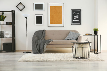 Interior of modern room with comfortable sofa