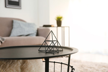 Table with decor in modern room
