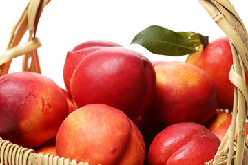 ripe peach on white background