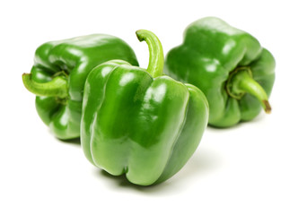 fresh green bell pepper (capsicum) on a white background - obrazy, fototapety, plakaty