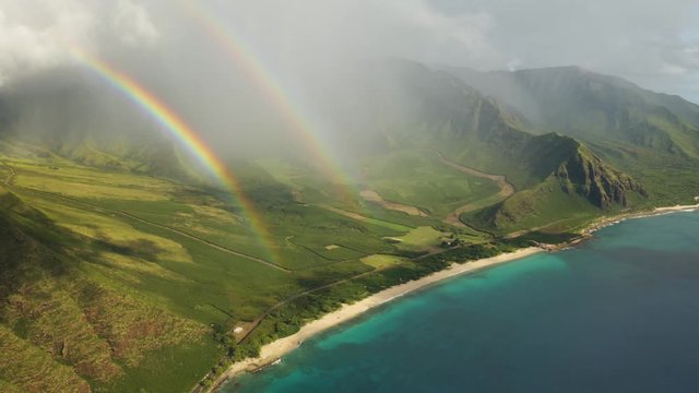 double rainbow over ocean