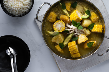 Chicken soup with potato and corn