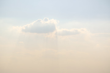 Light beam and clouds in sky