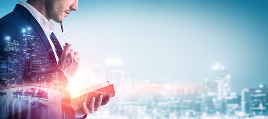 Double Exposure Image of Business Person on modern city background. Future business and...
