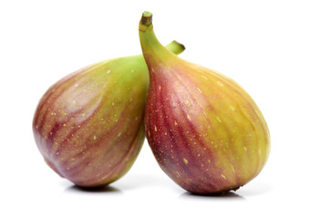 Ripe figs on a white background