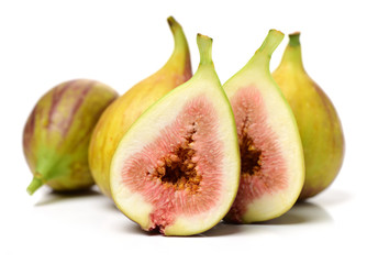 Ripe figs on a white background