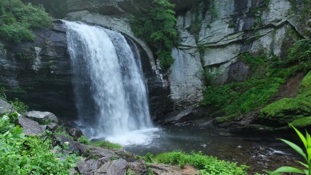 Looking Glass Falls, a large waterfall near Asheville, North Carolina in the town of Brevard in the Pisgah National Forest