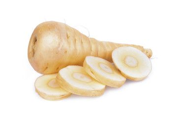 parsnip root with slices vegetable isolated on white background - obrazy, fototapety, plakaty