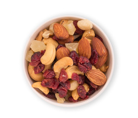 mixed nuts and dried fruits in the white bowl isolated on white background, food for health, flat lay, top view