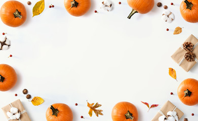 Autumn theme with orange pumpkins - flat lay