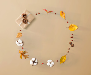 Gift box with autumn theme - overhead view flat lay