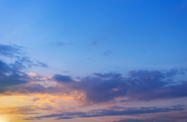 Blue sky with white clouds. Sunlight. Bright sky. Good weather. There was light shining from the clouds.