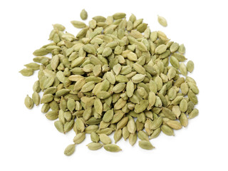 Green cardamom pods on white background
