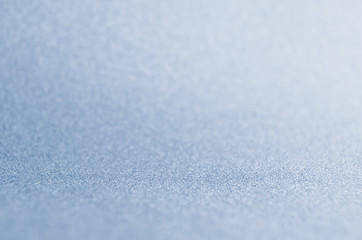 Obraz premium Light blue winter shine glittering bokeh background for New Year and Christmas background.