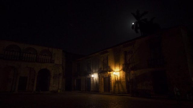 Colonial age Old Havana street at night time 
