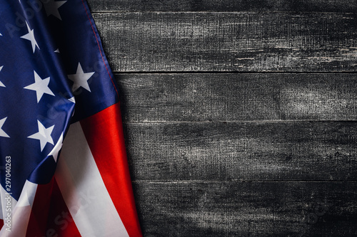 American flag on dark background.Flag Veterans Day Concept with place for your text