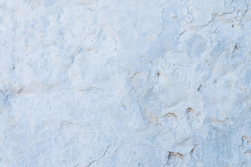 Blue plastered repeatedly brick wall texture. Whitewash Brick wall facade building surface. White wash abstract background