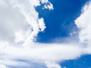Beautiful blue spring sky with lush clouds.