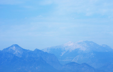 Fototapeta na wymiar mountains against the blue sky.