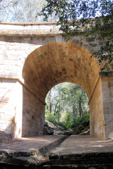 Sandstone Bridge Arch Over a River in the Blue Mountains Australia