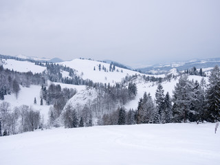 Winter mountains landscape. Beresnik Mount, Smolegowa and Kociubylska Skala in Pieniny, Poland.