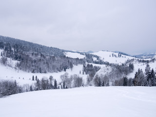 Winter mountains landscape. Beresnik Mount and Kociubylska Skala in Pieniny, Poland.