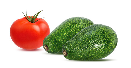 Fresh avocados and tomato isolated on white background with clipping path