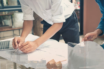 architect engineer working on house blueprint of real estate project. building construction concept.