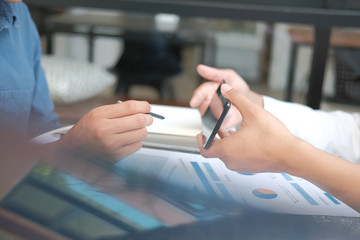 businessman signing contract with digital pen on mobile phone. man giving electronic signature on...