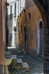 Street of the old part of San Siro comune on Como lake, Italy