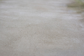 Background with a stone surface shot at an angle with a very small depth of field and a very blurred foreground and background