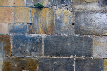 Background of old stone blocks of different colors
