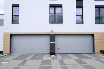 Naklejka na ściany i meble Two garages in modern residential building.