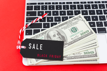 Online shopping Black Friday sale text on Promotion Black tag label on laptop computer