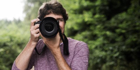 Photographer taking photo at you