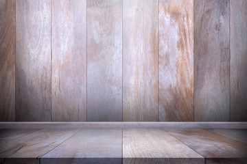 Wood table top with wooden wall background. Used for product placement or montage.
