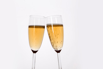 Glasses of champagne on an isolated white background