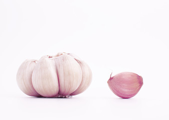Garlic on white background. Can used for background of health care products , such as garlic oil product.