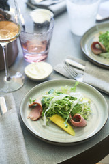 Freshly made duck salad with mango