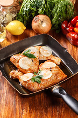 Raw chicken legs marinated