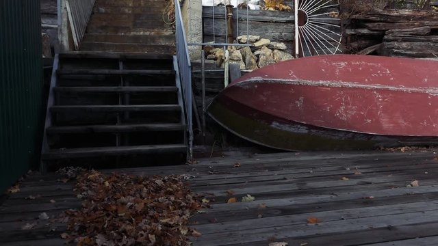 an old abandoned boat lying near the pier